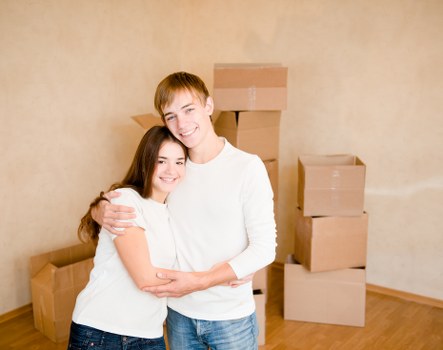 Boxes and household items neatly arranged in a Swiss Cottage storage setting