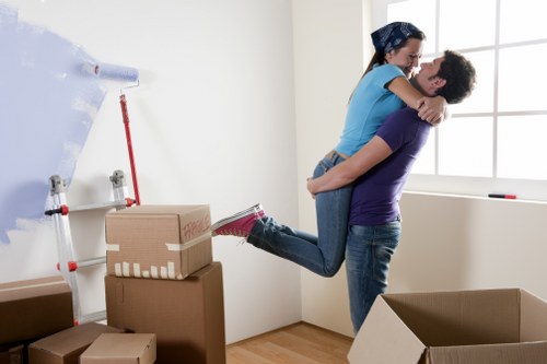 Local removal team managing furniture transport in Swisscottage