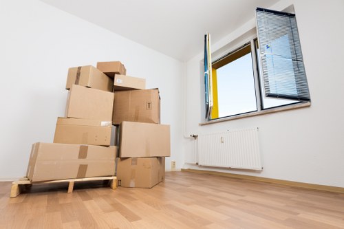 Organized storage boxes and luggage for students in Swisscottage