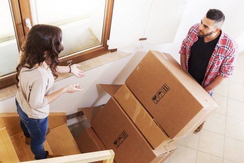 Packed boxes and furniture prepared for a small move